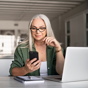 woman researching fintech on her phone